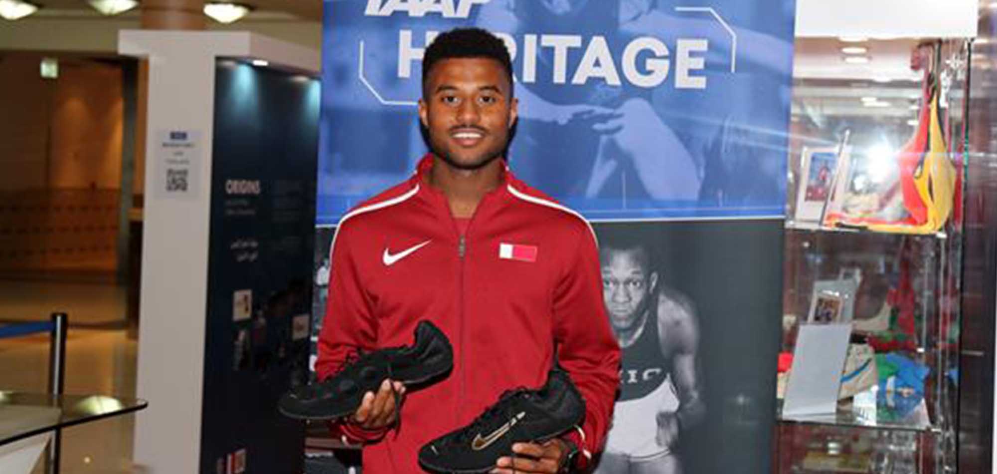 IAAF HERITAGE - QATAR’S YOUTH OLYMPIC CHAMPION BARROW ACCEPTS KIT LOANS FROM HURDLING HEROES DEVERS AND JOHNSON