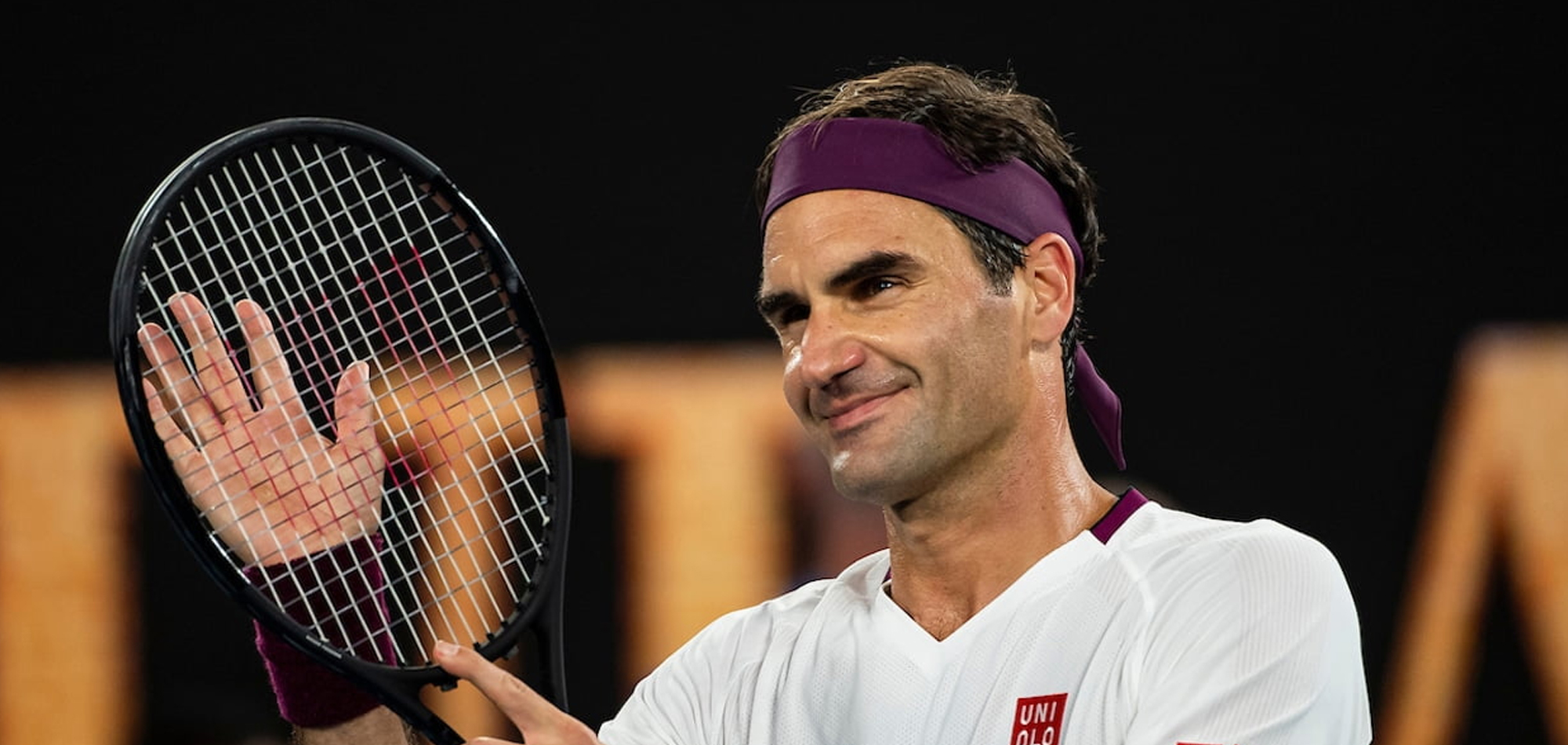 Federer training and committed to playing in Australia