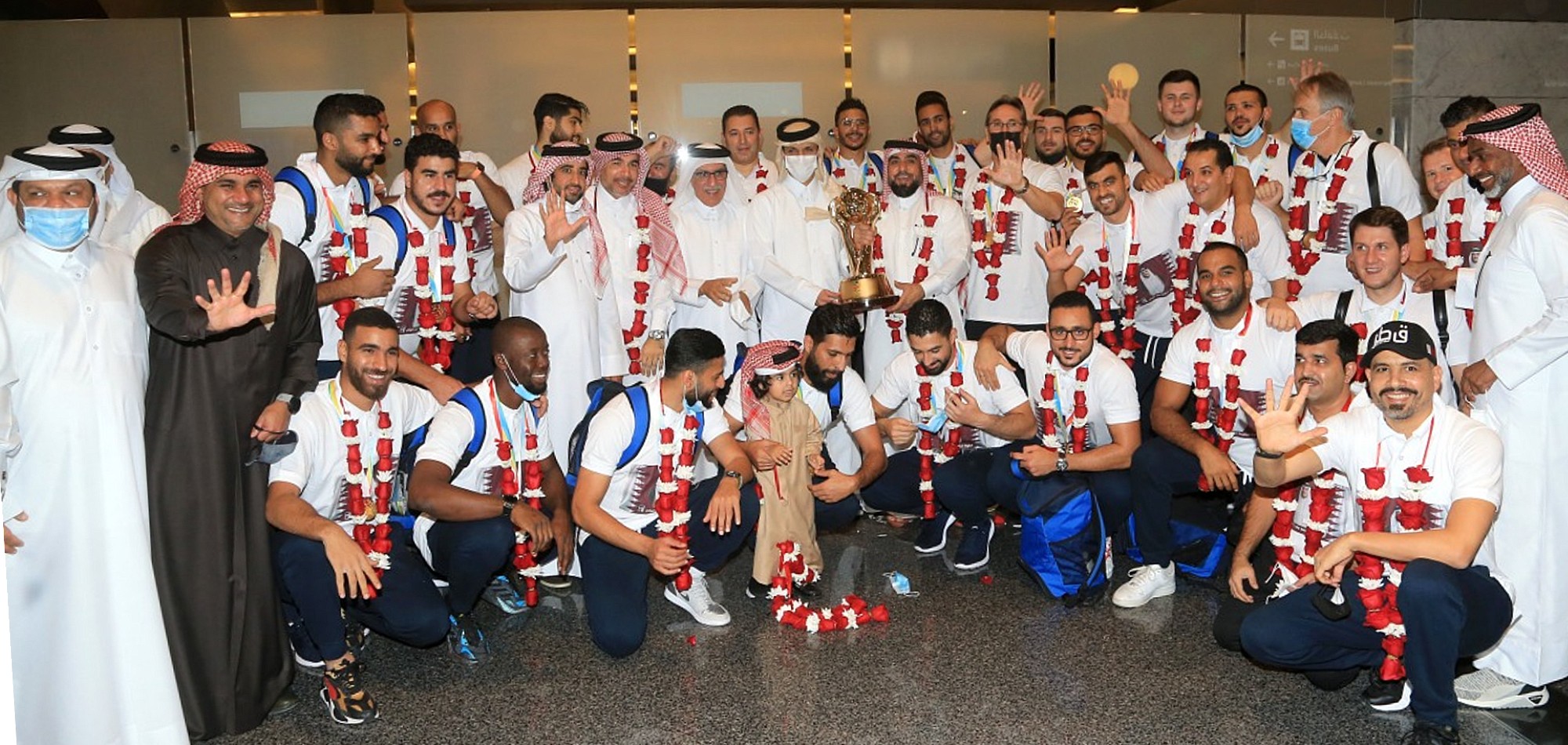 Triumphant Qatar team returns home to heroes’ welcome
