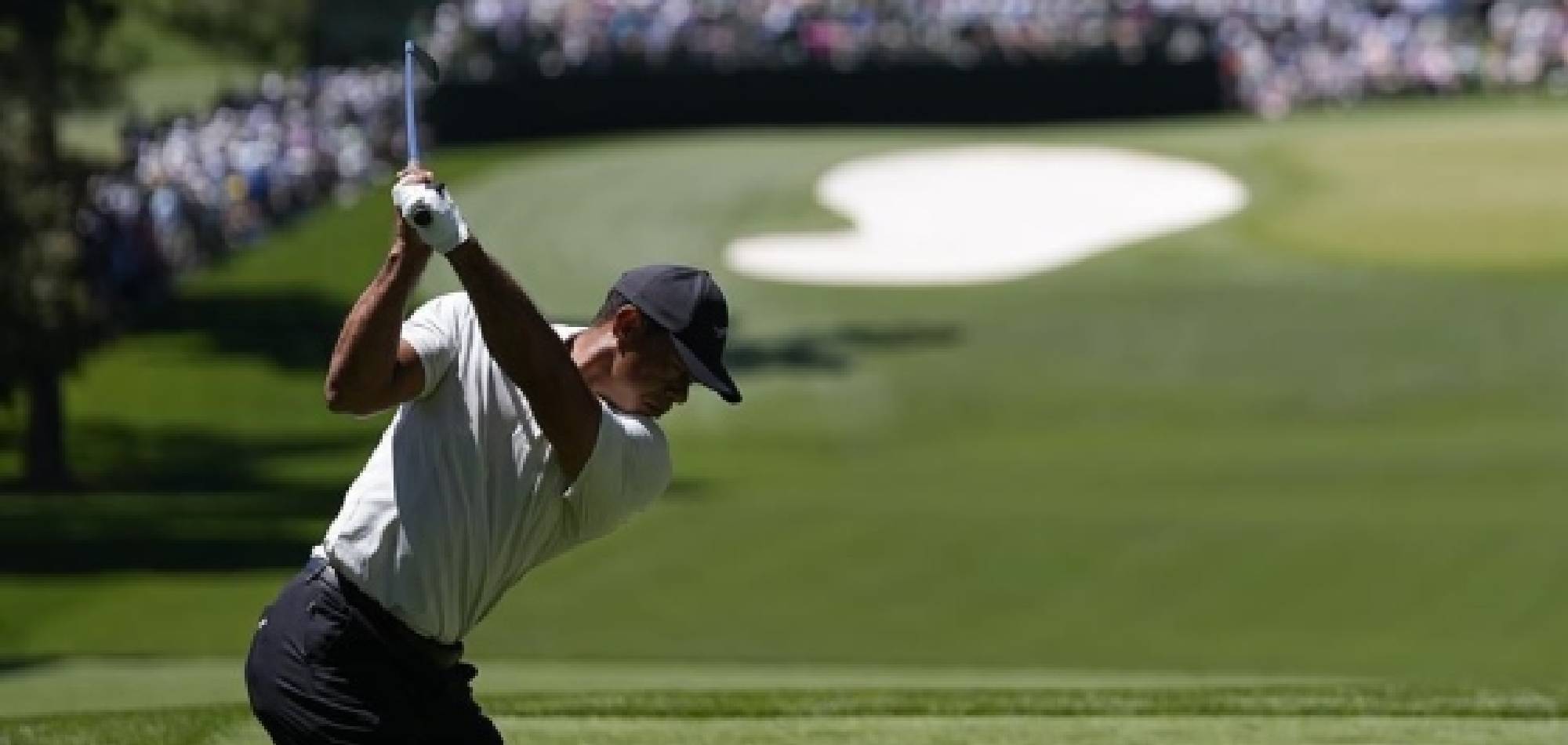 Tiger Woods on the course for 100th round at the Masters after getting swing tips from son Charlie