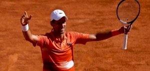 Djokovic sees off Karatsev to ease into last 16 in Rome