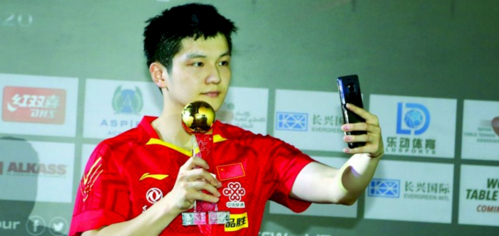 Double delight for China as Zhendong, Meng win titles