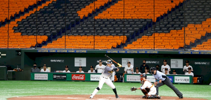 Japanese baseball begins in eerie silence