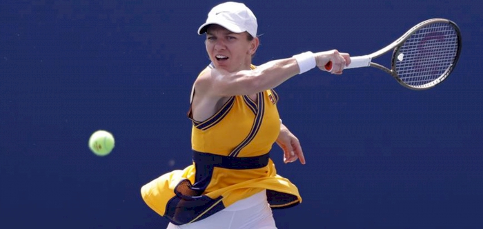 HALEP ADVANCES AT US OPEN AS FANS RETURN