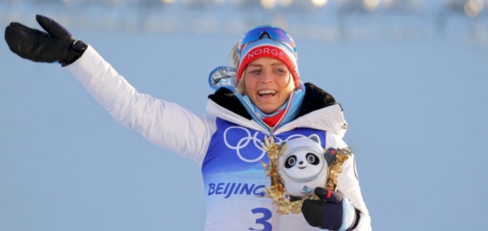 Johaug wins 1st gold medal of Beijing Olympics in skiathlon