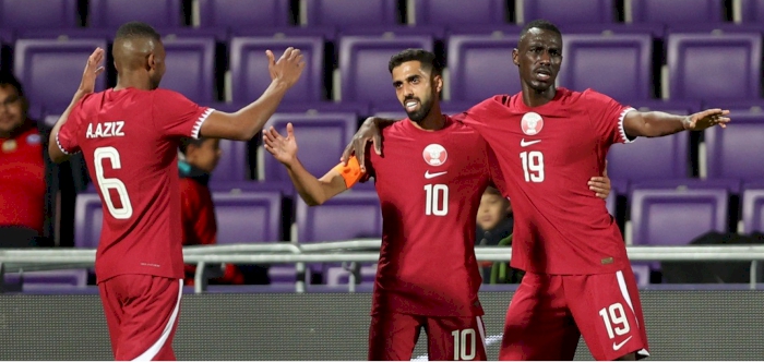 Qatar fight back to draw with Chile