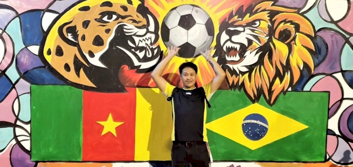 Filipino artist in Qatar paints one mural daily throughout the World Cup