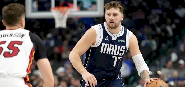 ‘You’re seeing something as rare as a Picasso’: Luka Dončić makes history in Dallas Mavericks win over Miami Heat  