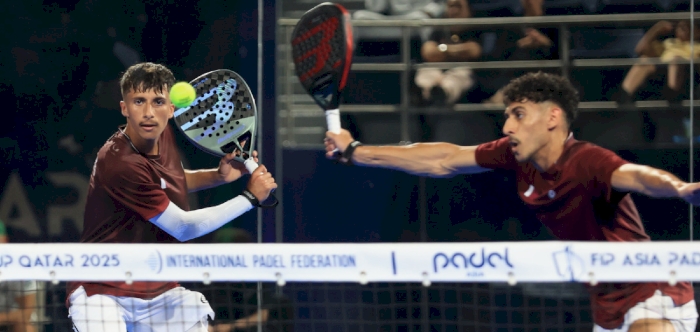 Qatar beat Australia to top group, book semis clash with Iran